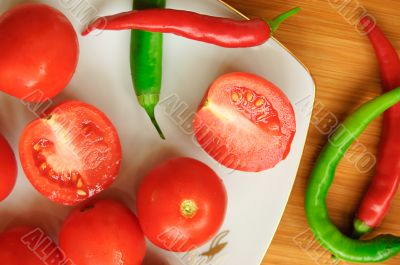 Some tomatos, green and red pepper