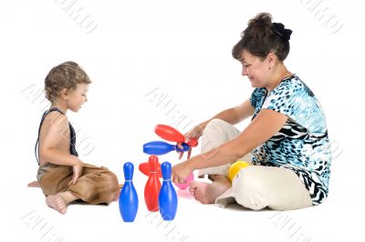 mother with boy play skittles