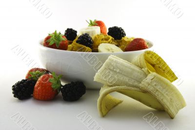 Cornflakes and Fruit in a White Bowl with Banana