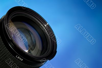 Photography lens over blue