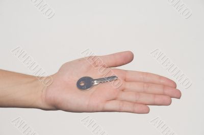 Hand with key