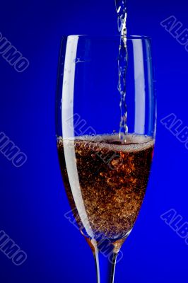 champagne glasses macro on blue