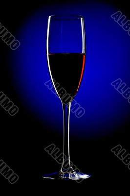 champagne glasses on blue background