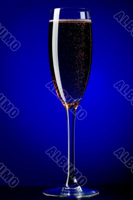On blue champagne glasses