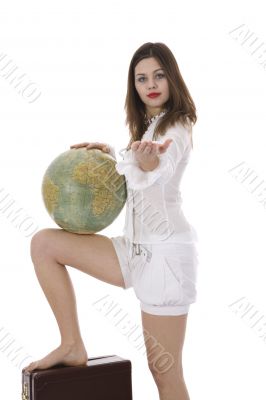 Young woman with  suitcase and globe