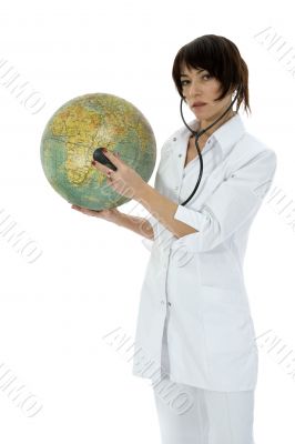 young doctor with stethoscope and globe