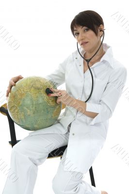 young doctor with stethoscope and globe