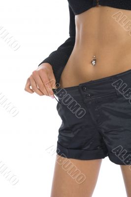 Woman showing how much weight she lo