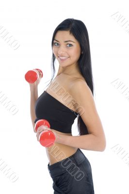 beautiful girl with dumbbells