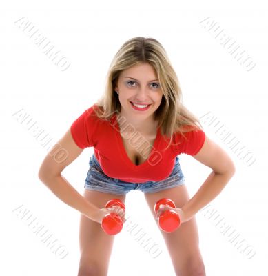 beautiful girl with dumbbells