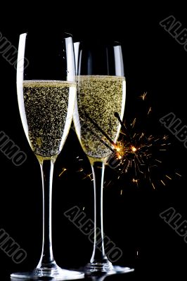 champagne and sparkles on black