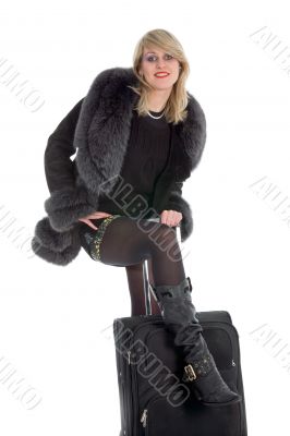 Beautiful blonde with valise