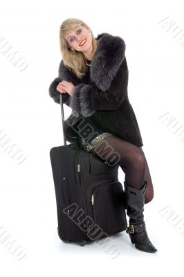 Beautiful blonde with valise