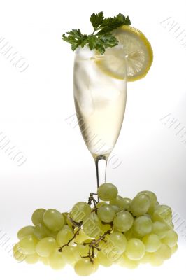 champagne glasses with green grapes