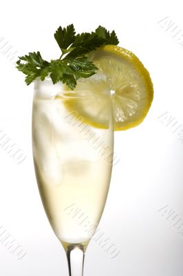 champagne glasses with lemon close up