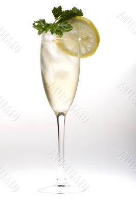 champagne glasses with lemon closeup