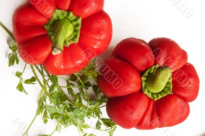 Some red peppers and greens