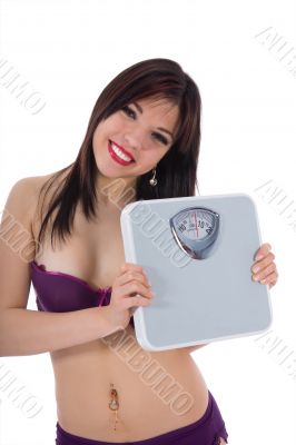 beautiful girl with  scales on  white background