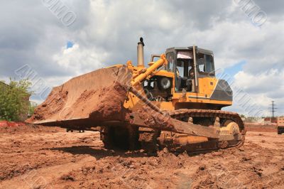 The heavy building bulldozer