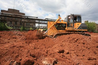 The heavy building bulldozer