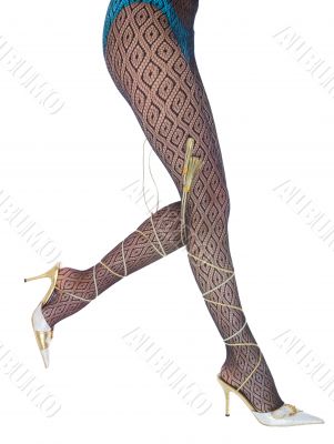 Long woman legs  in white dancing-slippers