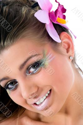 Girl with face-art butterfly paint