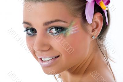 Girl with face-art butterfly paint