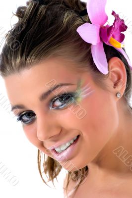 Girl with face-art butterfly paint