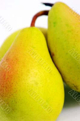 yellow pear close-up isolated on white background