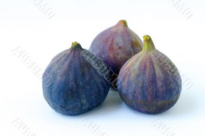 Fresh figs on white background