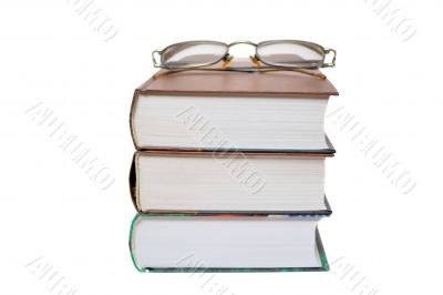 Eyeglasses on the books 
