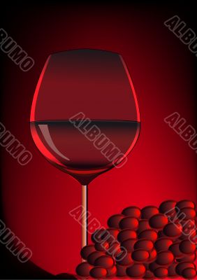 goblet red blame and branch of grape