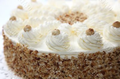 Cream cake with almond edge