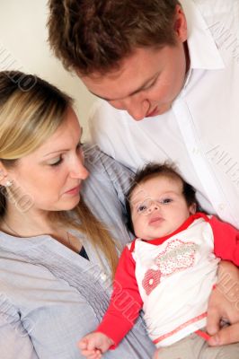 Young family with a baby.