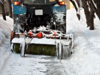 Tractor clears snow
