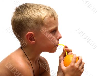 Child with an orange.
