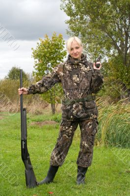 Female with gun.