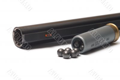 Shotgun and cartridge.