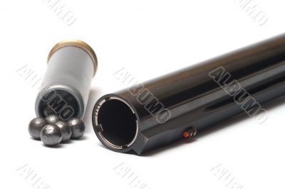 Shotgun and cartridge.