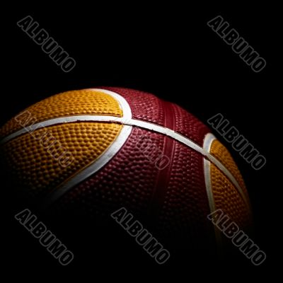 Close-up of a basketball isolated on black background