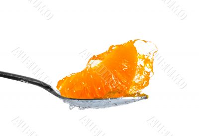 mandarin in jelly on spoon