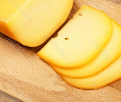 cheese slices on cutting board