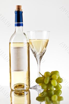 bottle and glass of wine, grape bunch