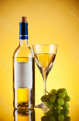 bottle and glass of wine, grape bunch
