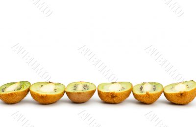 kiwi halves laying in row