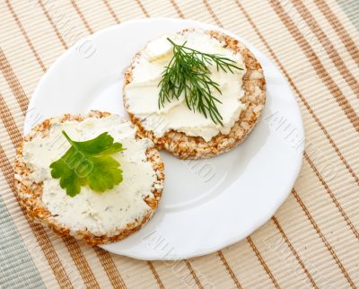 two corn bread on white dish