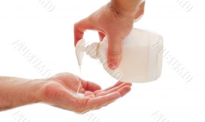 washing hands with liquid soap