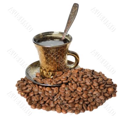 A cup of coffee and coffee beans