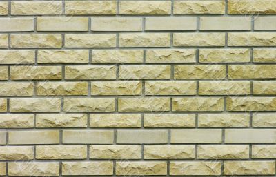 Yellow brcik wall background.