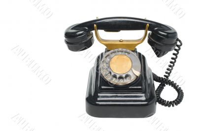 Old vintage black phone with disc dials with cliping path.